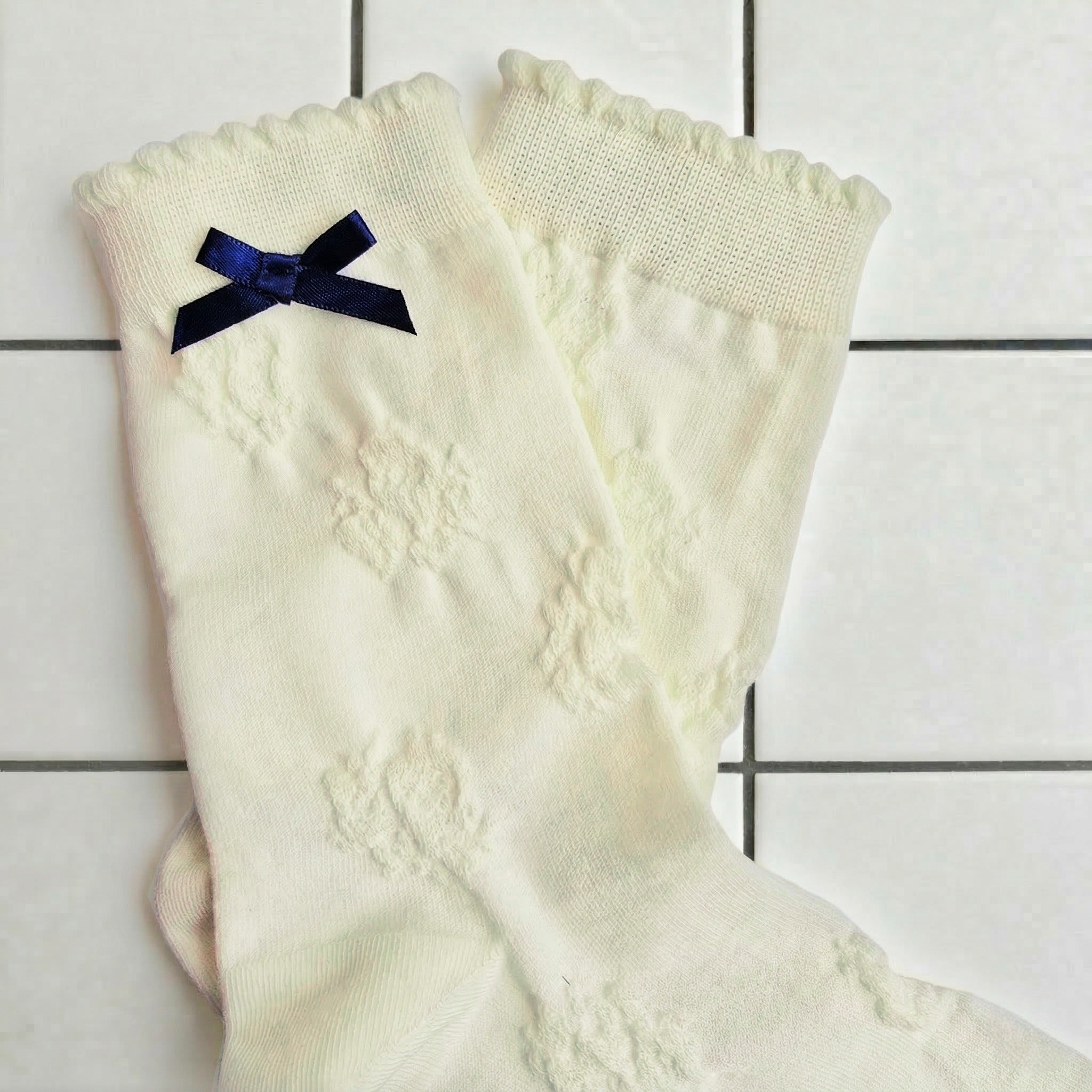107. Flower Jacquard Polly with Navy Bow