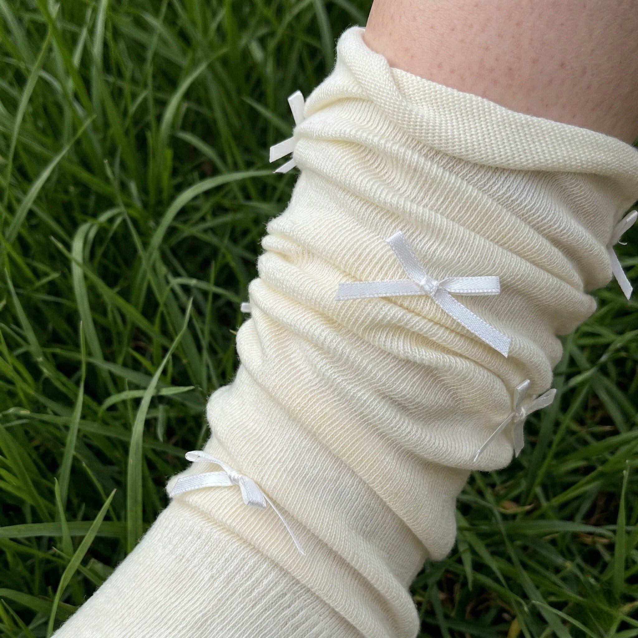 108. Long Creme Polly with Baby Bows